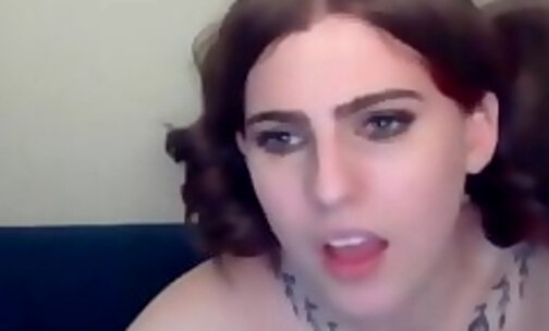 brunette teen American tgirl with tattoos wanks on webcam