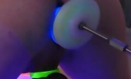 TGirl Lucy glow in the dark chastity and fucked by glowing blue dildo