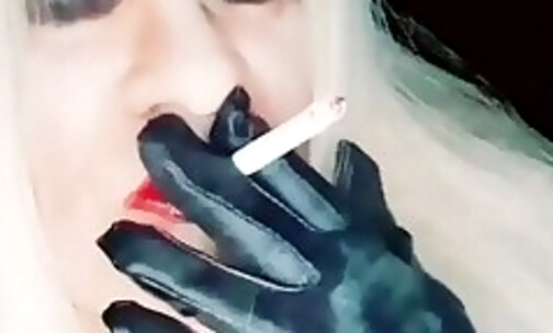 red lips smoking latex gloves