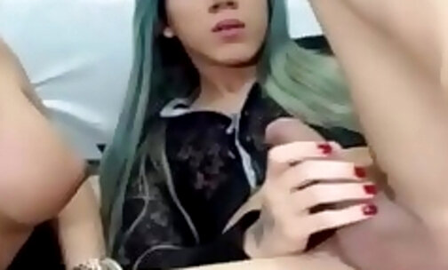 attractive stroking her penis live