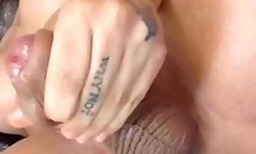 Inked Up Columbian Trans Strokes Her Thick Cock For You
