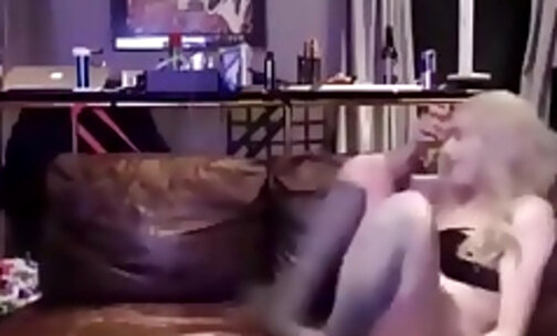 Blond tranny fucking her slave on the couch