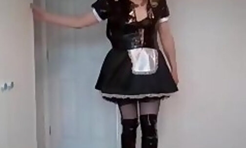 Blonde in latex maid's outfit and boots