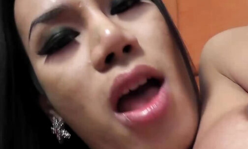Petite ladyboy with high heels gets her ass licked by a guy on the couch