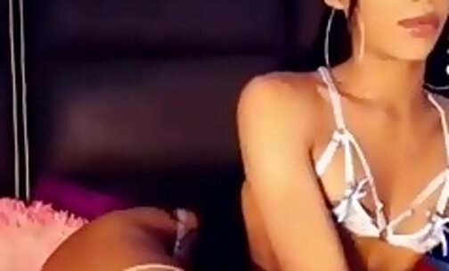 black long haired transgirl shows her cute little ass on webcam