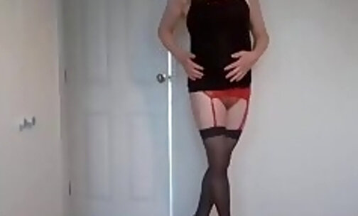 Stripping out of my little black dress with hold up stockings