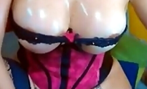 huge breasts on this stroking tranny