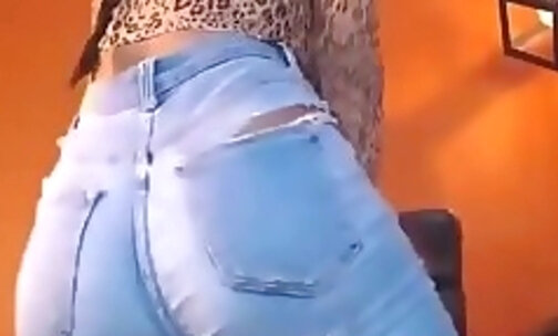 large cock heshe in jeans caressing her gigantic bulge