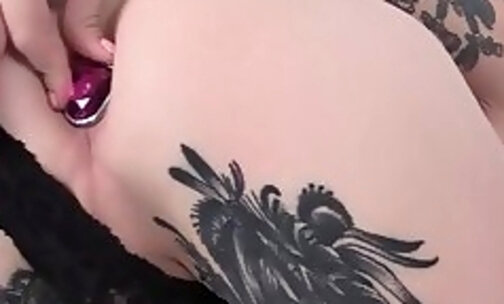 TS seductress shows off her butt and tugs her love cannon