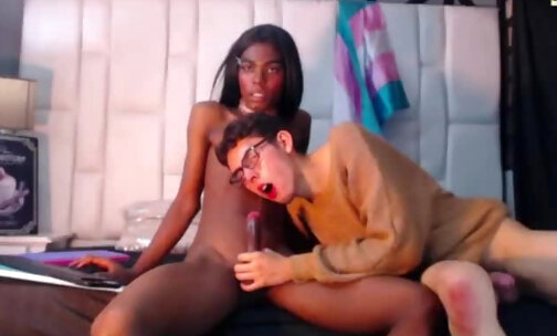 skinny black transgirl gets blowjob by her white glassesed boyfriend on webcam