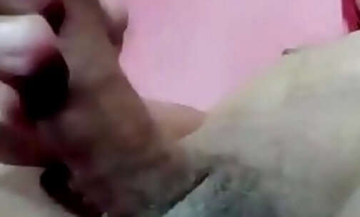 redhead latina transgirl tugs her small cock on webcam