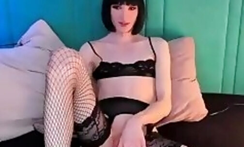 skinny transgirl in fishnet stockings strokes her big sheshaft on webcam