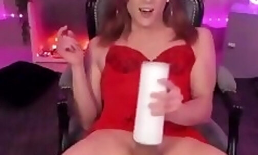 redhead petite sissy in red lingerie masturbates with a fleshlight on webcam