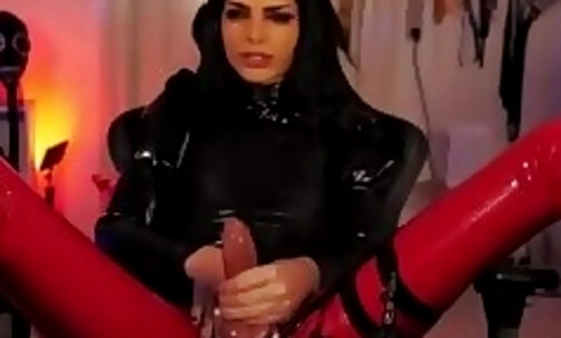 slim Denmark TS in leather strokes her nice cock on webcam