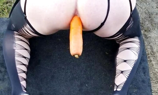 CD Outdoor dressed fuck with huge carrot anal play . Part 1