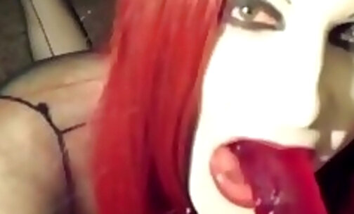 Gothic redhead tranny shows her amazing body