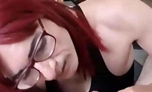 Letting a redhead shemale suck meaty cock